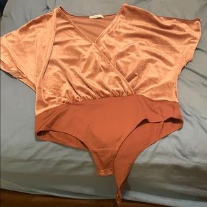 Pink velvet body suit